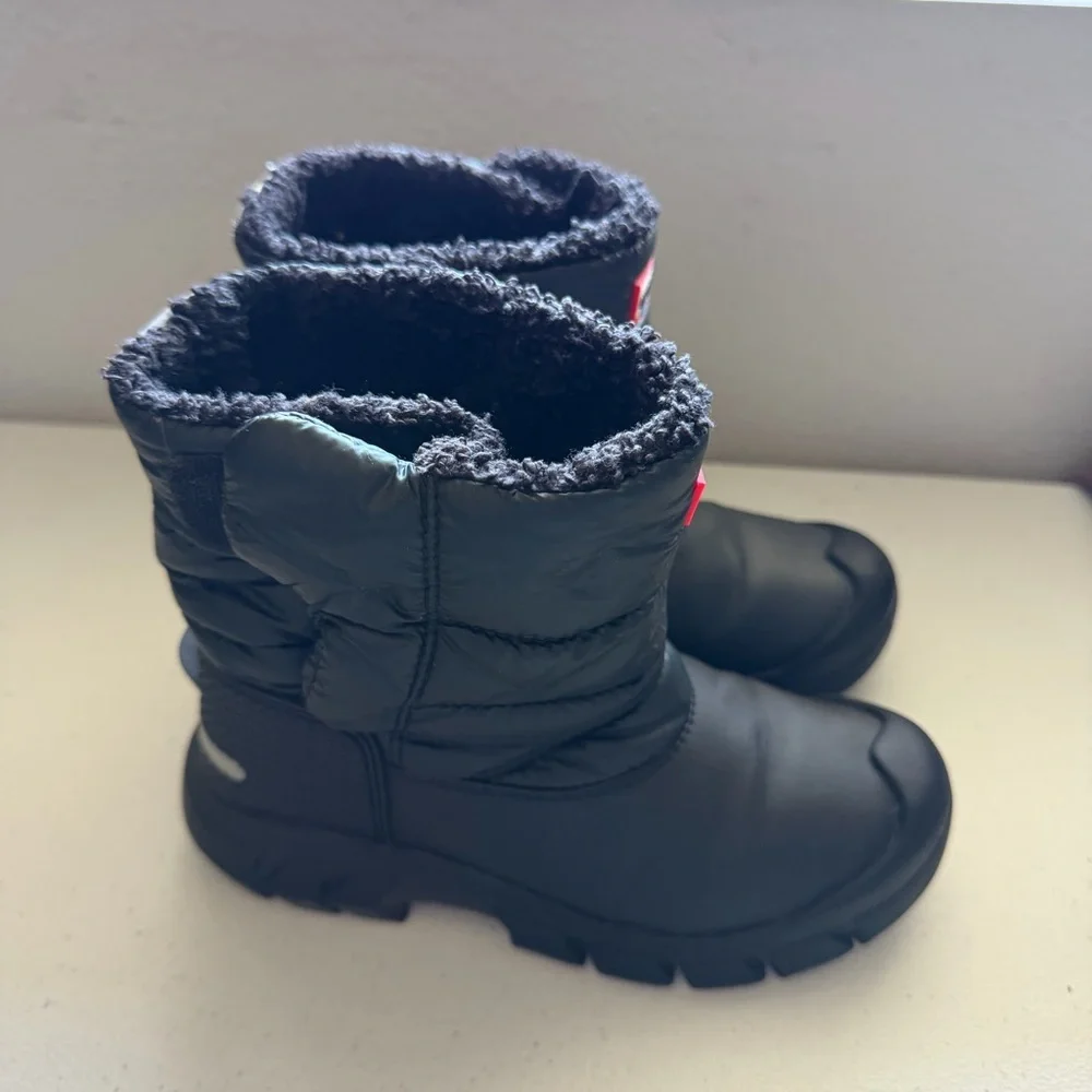 Hunter Kids' Intrepid Insulated Snow Boots in black.